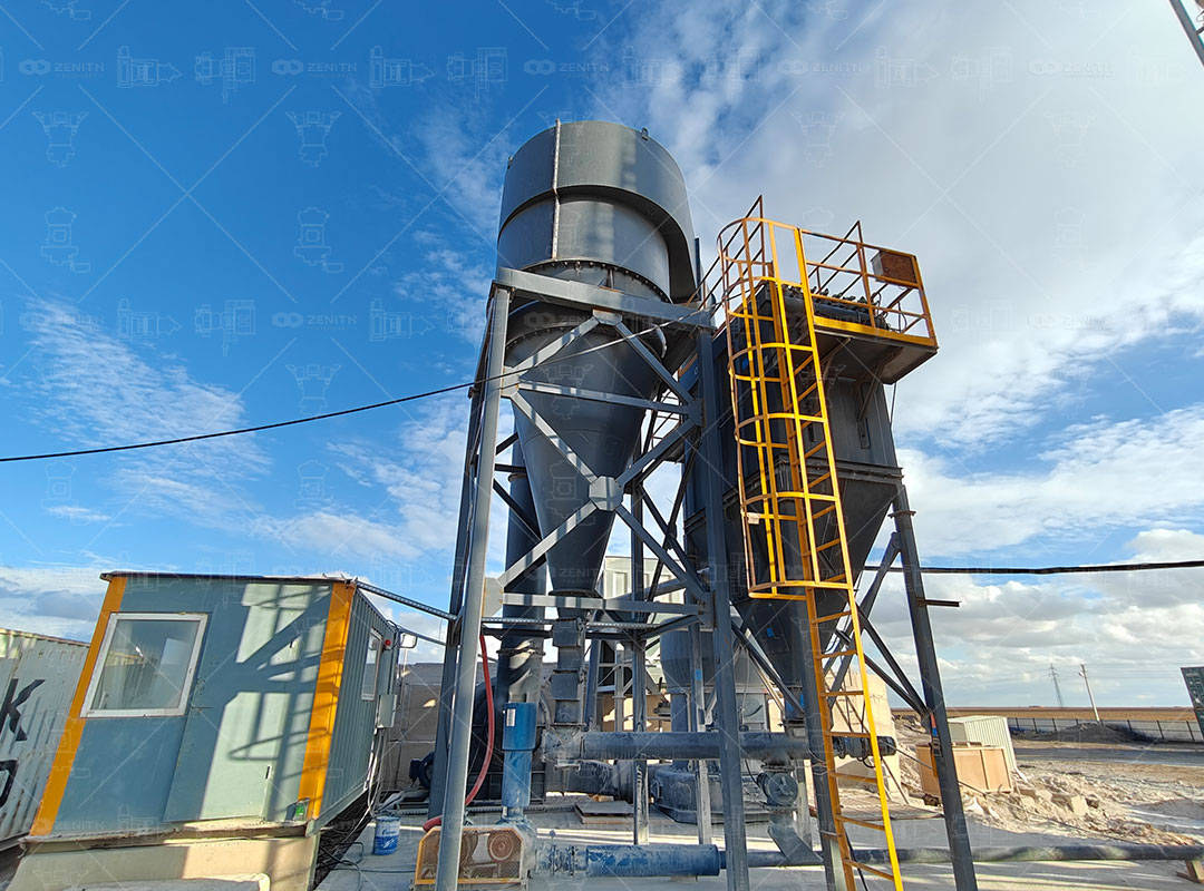 A close-up of an automated touchscreen control panel for monitoring and operating a grinding mill.